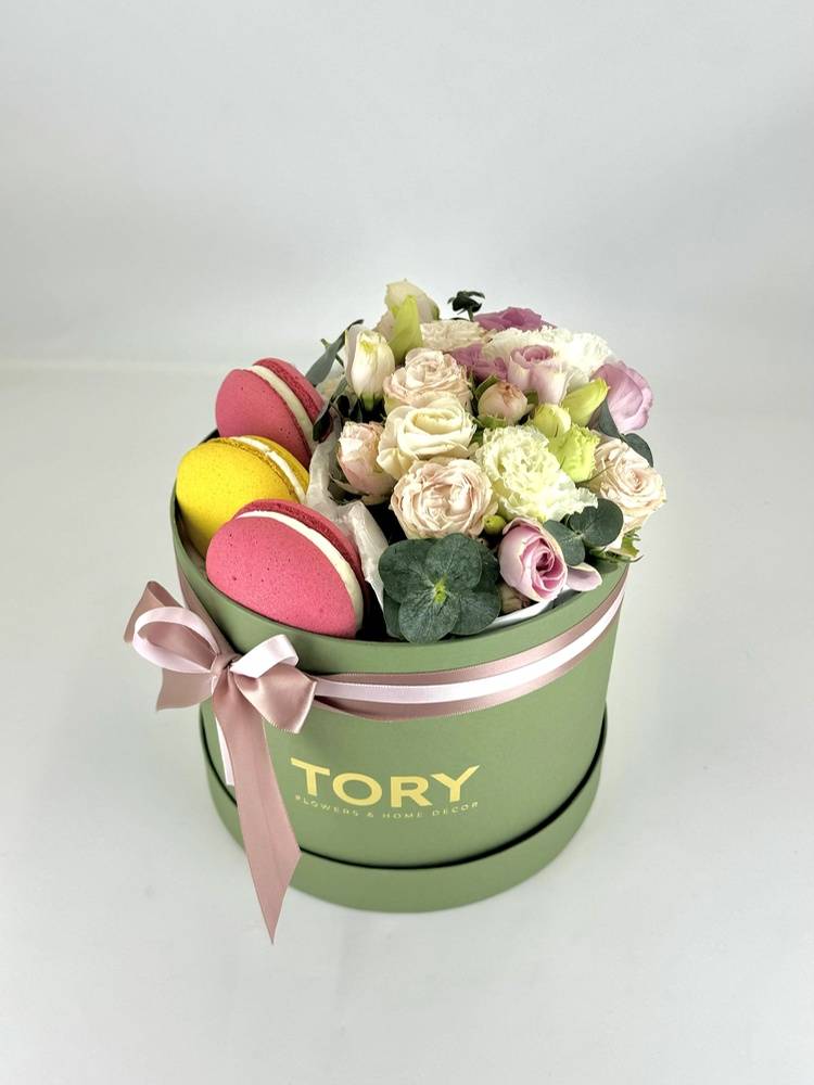 Flowers in a box with sweets 