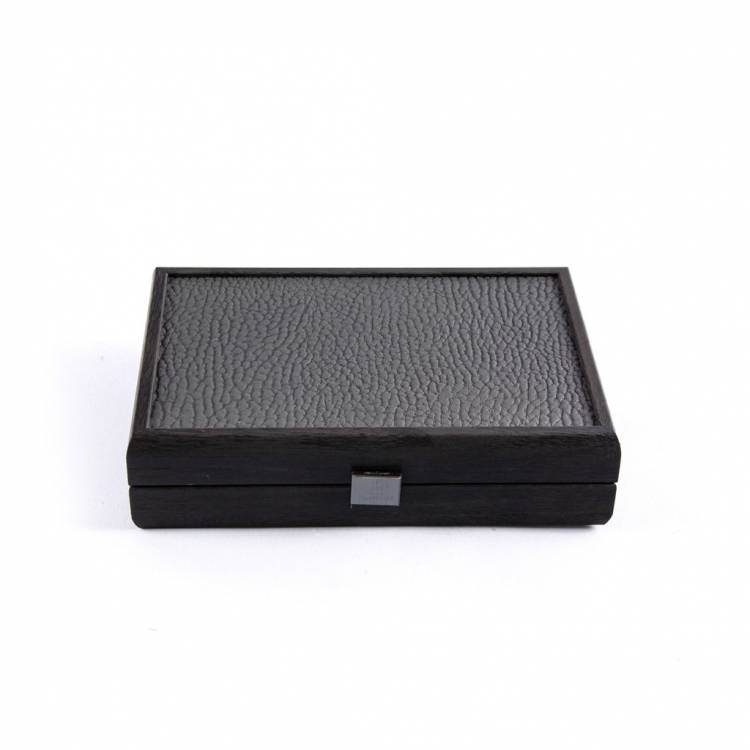 Playing cards with plastic coating in a dark gray wooden case