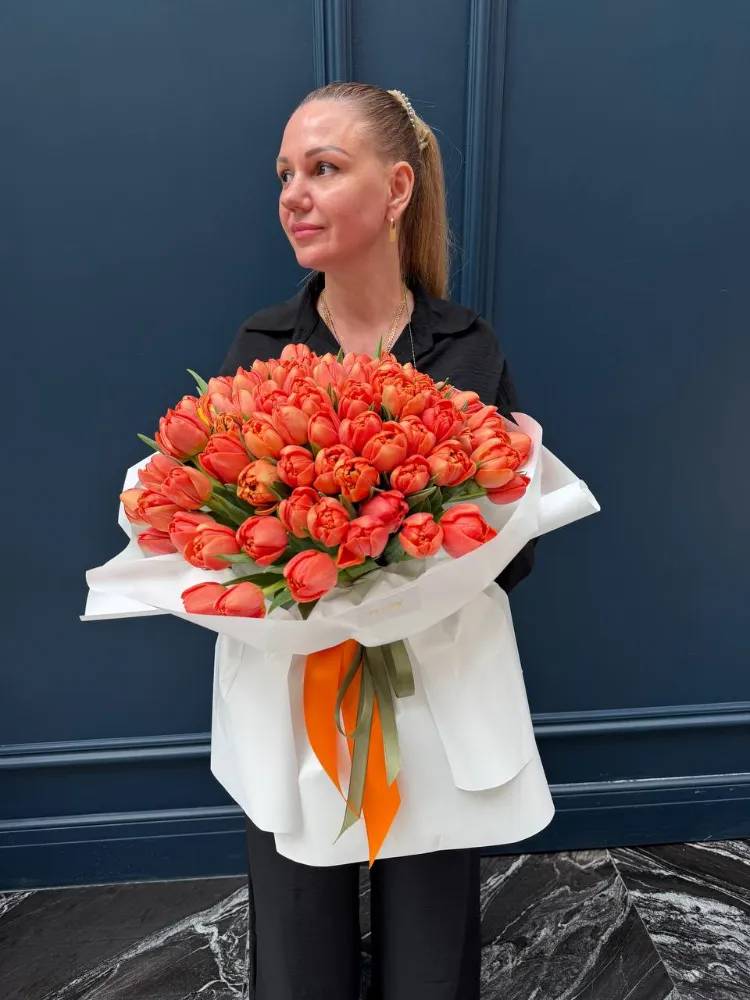 A bouquet of 101 orange peony tulips