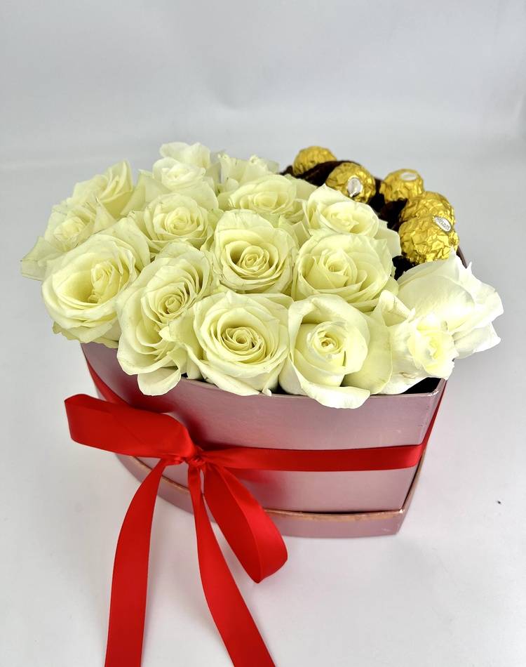 Roses in a box with sweets 