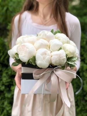 White peonies in a box 