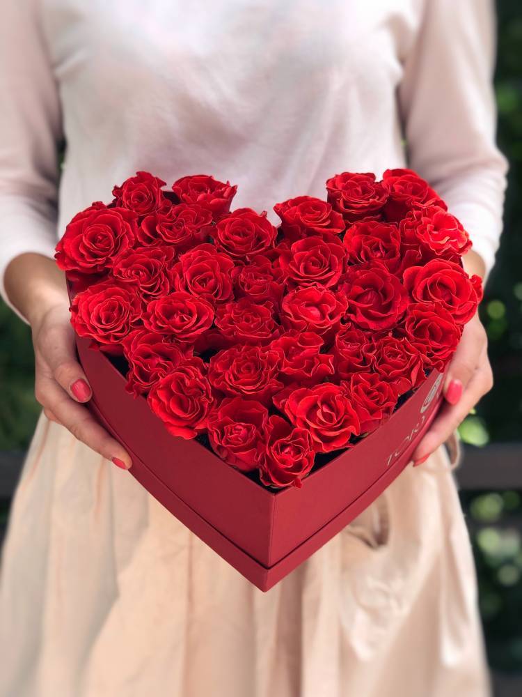 31 red roses in a heart-shaped box