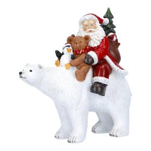 Santa sitting on polar bear poly-24,5x11,5x23cm - flowers delivery Dubai