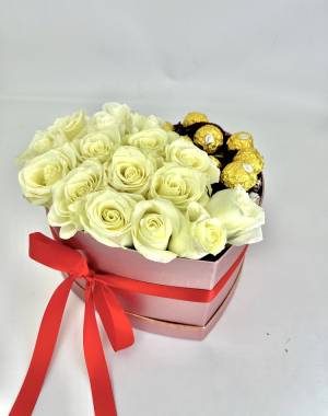 Roses in a box with sweets 