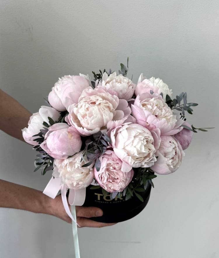 Pink peonies in a box 