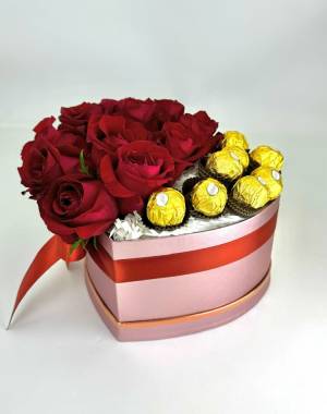 Roses in a box with sweets 