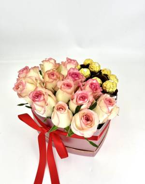 Roses in a box with sweets 