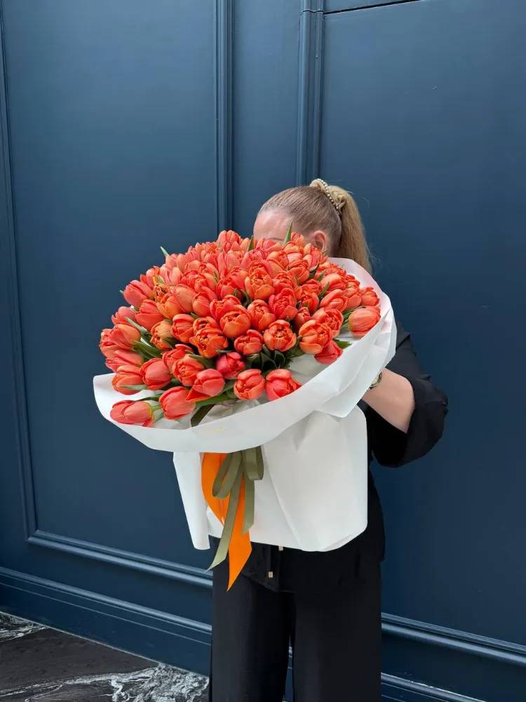 A bouquet of 101 orange peony tulips