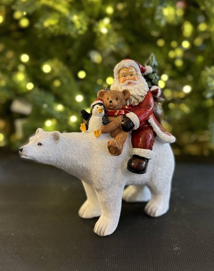 Santa sitting on polar bear poly-24,5x11,5x23cm