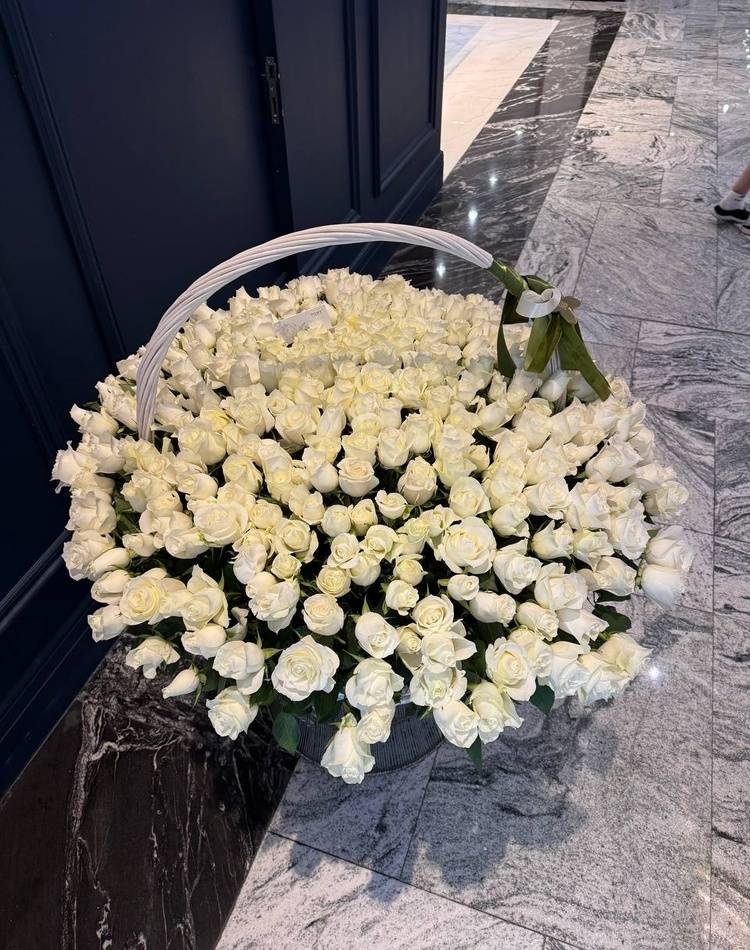 301 white roses in a basket