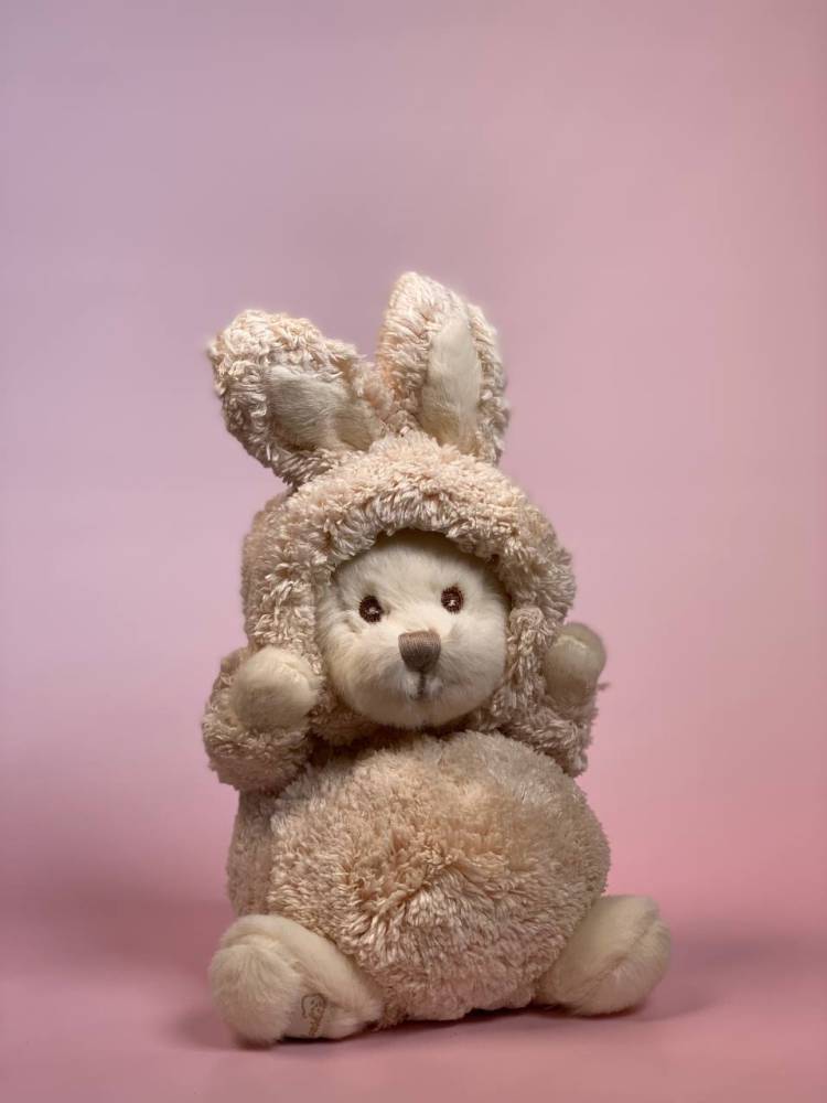 Soft toy Ziggi in a creamy bunny costume, 15 cm