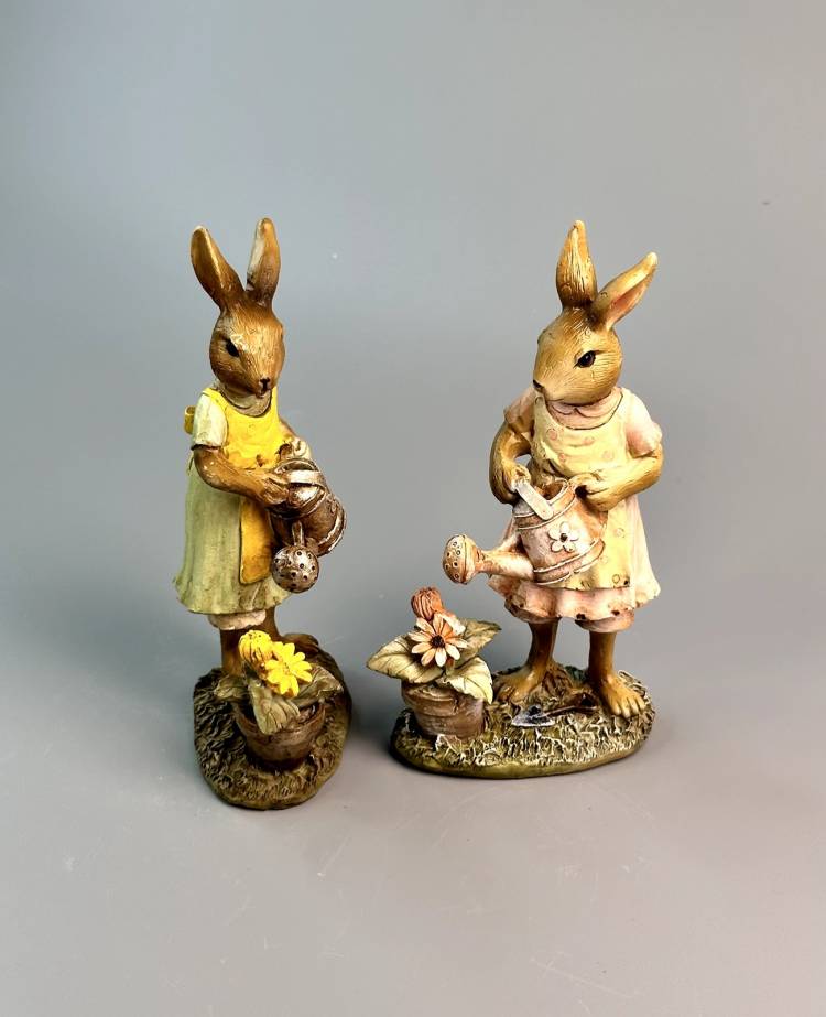 Statue of a Hare watering a flowerbed