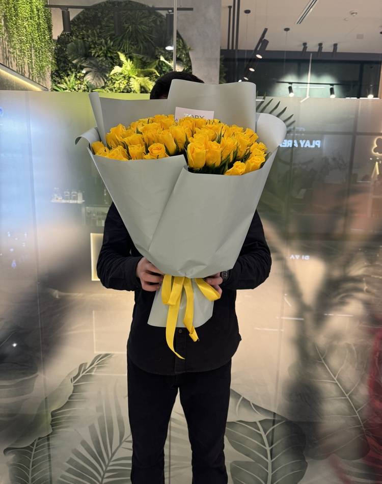 bouquet of 51 yellow roses in packaging