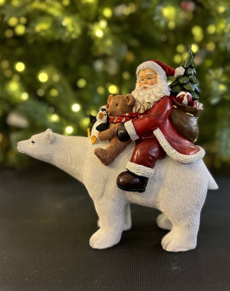 Santa sitting on polar bear poly-24,5x11,5x23cm