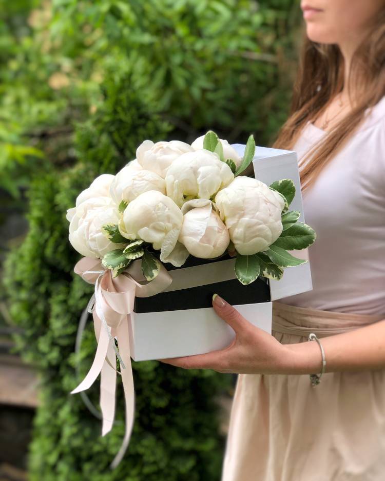 White peonies in a box 